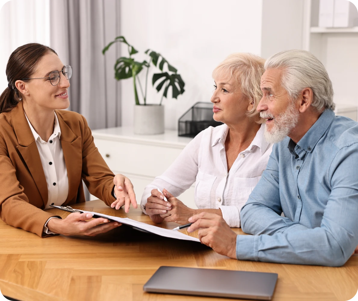 Advisor meeting with an elderly couple.