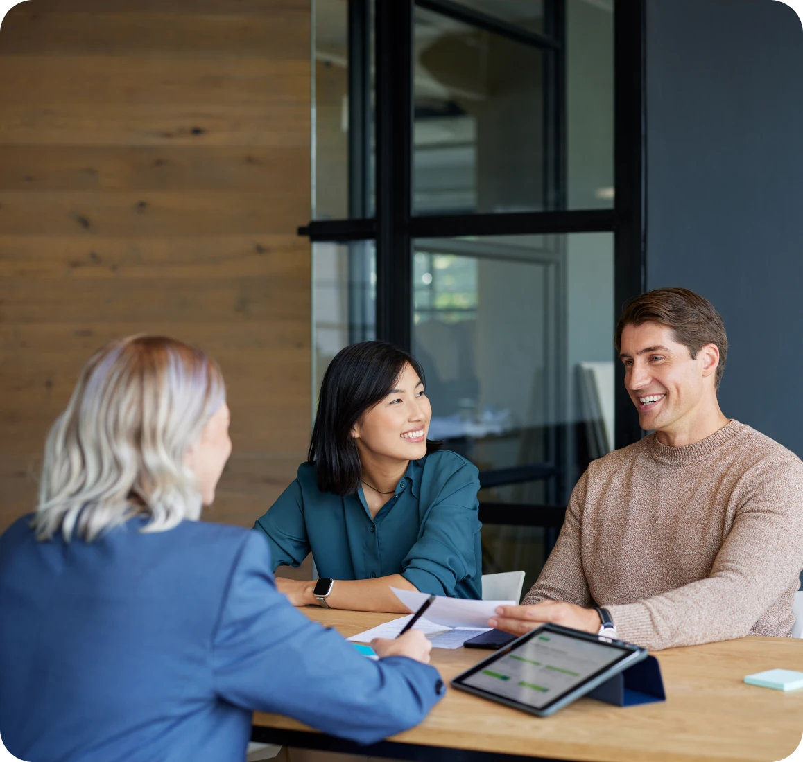 People having a meeting in an office.